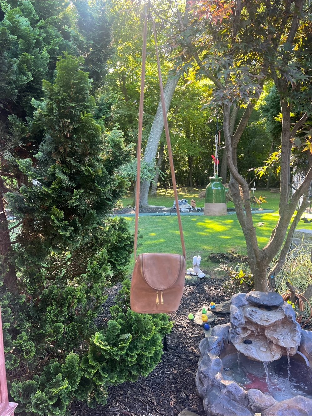HOBO Brown Leather Crossbody Bag with Tassel Detail